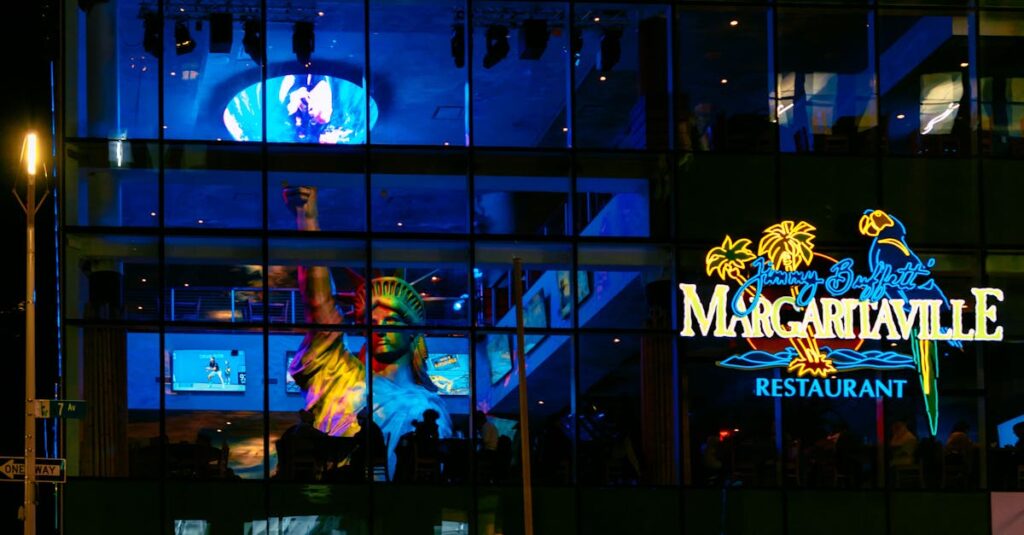 Vibrant night view of Margaritaville Restaurant and Landshark Bar & Grill in Times Square, NYC.